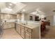 Open kitchen with granite countertops, stainless steel appliances, and a tile backsplash at 8082 E Via Del Vencino --, Scottsdale, AZ 85258