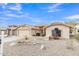 Charming home with desert landscaping, light-colored stucco, and a tile roof at 8096 E Lavender Dr, Gold Canyon, AZ 85118