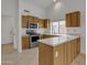 Bright kitchen features stainless appliances, a corner sink, and ample counter space at 8096 E Lavender Dr, Gold Canyon, AZ 85118