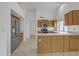 Kitchen with stainless appliances, light wood cabinets and island at 8096 E Lavender Dr, Gold Canyon, AZ 85118