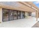 A covered outdoor patio provides shade and access to the backyard at 8096 E Lavender Dr, Gold Canyon, AZ 85118