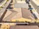 An overhead view of the house featuring a tile roof, neutral paint, and a fenced backyard at 8552 S 258Th Dr, Buckeye, AZ 85326