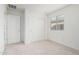 Bedroom features a closet and window, enhancing appeal at 8552 S 258Th Dr, Buckeye, AZ 85326