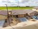 Charming single-story home with a tile roof, low-maintenance desert landscaping, and an attached two car garage at 8552 S 258Th Dr, Buckeye, AZ 85326