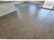Light-colored wood-look tiling throughout the open floor plan at , Maricopa, AZ 85138