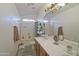 Bathroom with double sinks, vanity, and shower at 1107 W Tamarisk St, Phoenix, AZ 85041