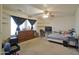 Bedroom featuring a ceiling fan and a large window for natural light at 1107 W Tamarisk St, Phoenix, AZ 85041