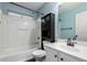 Bathroom featuring blue walls, a bath tub, and vanity with white cabinets at 1135 E Desert Holly Dr, San Tan Valley, AZ 85143