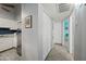 Hallway showing access to the kitchen, closet, and another room at 1180 E Belmont Ave, Phoenix, AZ 85020