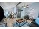 Open concept living and kitchen area with tile flooring and modern paint at 1180 E Belmont Ave, Phoenix, AZ 85020
