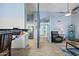 Open concept living and kitchen area with tile flooring and modern paint at 1180 E Belmont Ave, Phoenix, AZ 85020