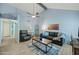 Spacious living room featuring vaulted ceiling, tile floors, and natural light at 1180 E Belmont Ave, Phoenix, AZ 85020