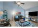 Cozy living room featuring vaulted ceilings, comfortable seating, and stylish decor at 1180 E Belmont Ave, Phoenix, AZ 85020