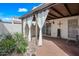 Back patio featuring garden, desert landscaping, and brick pavers at 1180 E Belmont Ave, Phoenix, AZ 85020