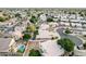 Aerial view showcases the property's backyard pool and great location in a well-maintained neighborhood at 1321 N Bronco Ct, Gilbert, AZ 85233