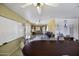Large open common room with ample space for tables and chairs at 1409 E Apollo Rd, Phoenix, AZ 85042