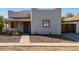 Charming single-story home featuring a tile roof, desert landscaping, and a cozy covered entrance at 1409 E Apollo Rd, Phoenix, AZ 85042