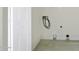 Ready-to-use laundry area with tile flooring and hookups at 1409 E Apollo Rd, Phoenix, AZ 85042