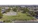 Aerial view of community park featuring a basketball court and green space at 1409 E Apollo Rd, Phoenix, AZ 85042