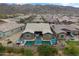 Backyard view of pool, outdoor seating, and desert landscaping at 1432 E Pedro Rd, Phoenix, AZ 85042
