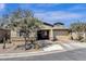 Charming single-Gathering home with a two-car garage, desert landscaping, and a covered entryway at 1432 E Pedro Rd, Phoenix, AZ 85042
