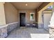 Inviting front porch area with chairs and a 'welcome home' mat at 1432 E Pedro Rd, Phoenix, AZ 85042