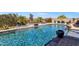 Stunning backyard pool with a waterfall feature and a telescope for stargazing at 1432 E Pedro Rd, Phoenix, AZ 85042