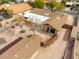 Home featuring a stone patio, skylights, desert landscaping, and a workshop with covered parking at 14418 N San Carlos Dr, Fountain Hills, AZ 85268