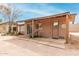 Charming backyard featuring a covered patio and desert landscaping at 14418 N San Carlos Dr, Fountain Hills, AZ 85268