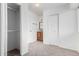 Bedroom with carpet floors, closet, and doors leading to the bathroom and hallway at 14418 N San Carlos Dr, Fountain Hills, AZ 85268