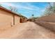 Long driveway leading to the house with desert landscaping at 14418 N San Carlos Dr, Fountain Hills, AZ 85268