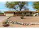 Charming single-story home featuring desert landscaping and a two-car garage at 14418 N San Carlos Dr, Fountain Hills, AZ 85268