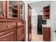 Kitchen pantry featuring natural wood cabinets and drawers for ample storage and organization at 14418 N San Carlos Dr, Fountain Hills, AZ 85268