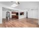 Bright open-concept living space features hardwood floors and a seamless connection to the kitchen area at 14418 N San Carlos Dr, Fountain Hills, AZ 85268