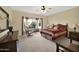 Main bedroom featuring a bay window with stylish furnishings at 15864 W Clearwater Way, Surprise, AZ 85374