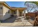 Inviting front porch with stylish columns and desert landscaping for enhanced curb appeal at 16875 W Manchester Dr, Surprise, AZ 85374