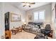 Living room with comfortable seating, natural light, and recreational equipment at 16875 W Manchester Dr, Surprise, AZ 85374