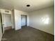 A modest bedroom with closet and carpet at 1819 W Morten Ave, Phoenix, AZ 85021