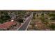 An elevated view shows neighborhood streets with homes and lush landscaping at 2107 E Inca St, Mesa, AZ 85213