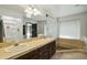 Bathroom featuring a double vanity, large mirror and decorative tile at 2107 E Inca St, Mesa, AZ 85213