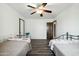 Bedroom features wood-look floors and dual twin beds at 2107 E Inca St, Mesa, AZ 85213