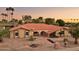 Expansive single-story home featuring a red tile roof, desert landscaping, and charming walkway at 2107 E Inca St, Mesa, AZ 85213
