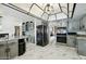 Spacious kitchen features gray cabinets, modern appliances, and a unique, decorative ceiling at 2107 E Inca St, Mesa, AZ 85213