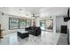 Relaxing living room with a view of the pool and backyard at 2107 E Inca St, Mesa, AZ 85213
