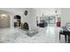 Inviting living room with a white marble fireplace, modern decor, and an open layout for entertaining at 2107 E Inca St, Mesa, AZ 85213