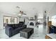 Bright living room with large windows, fireplace, and comfortable seating area at 2107 E Inca St, Mesa, AZ 85213