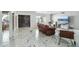Spacious living room with marble flooring, modern furniture, and a view of the outdoor scenery at 2107 E Inca St, Mesa, AZ 85213