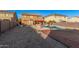 A spacious backyard featuring a pool, outdoor seating area, and barbecue station, perfect for entertaining guests at 22157 W Moonlight Path, Buckeye, AZ 85326