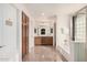 Bright bathroom featuring a double vanity, spacious shower, and a separate soaking tub at 22157 W Moonlight Path, Buckeye, AZ 85326