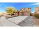 Charming two-story home with a well-manicured yard and a two-car garage at 22157 W Moonlight Path, Buckeye, AZ 85326